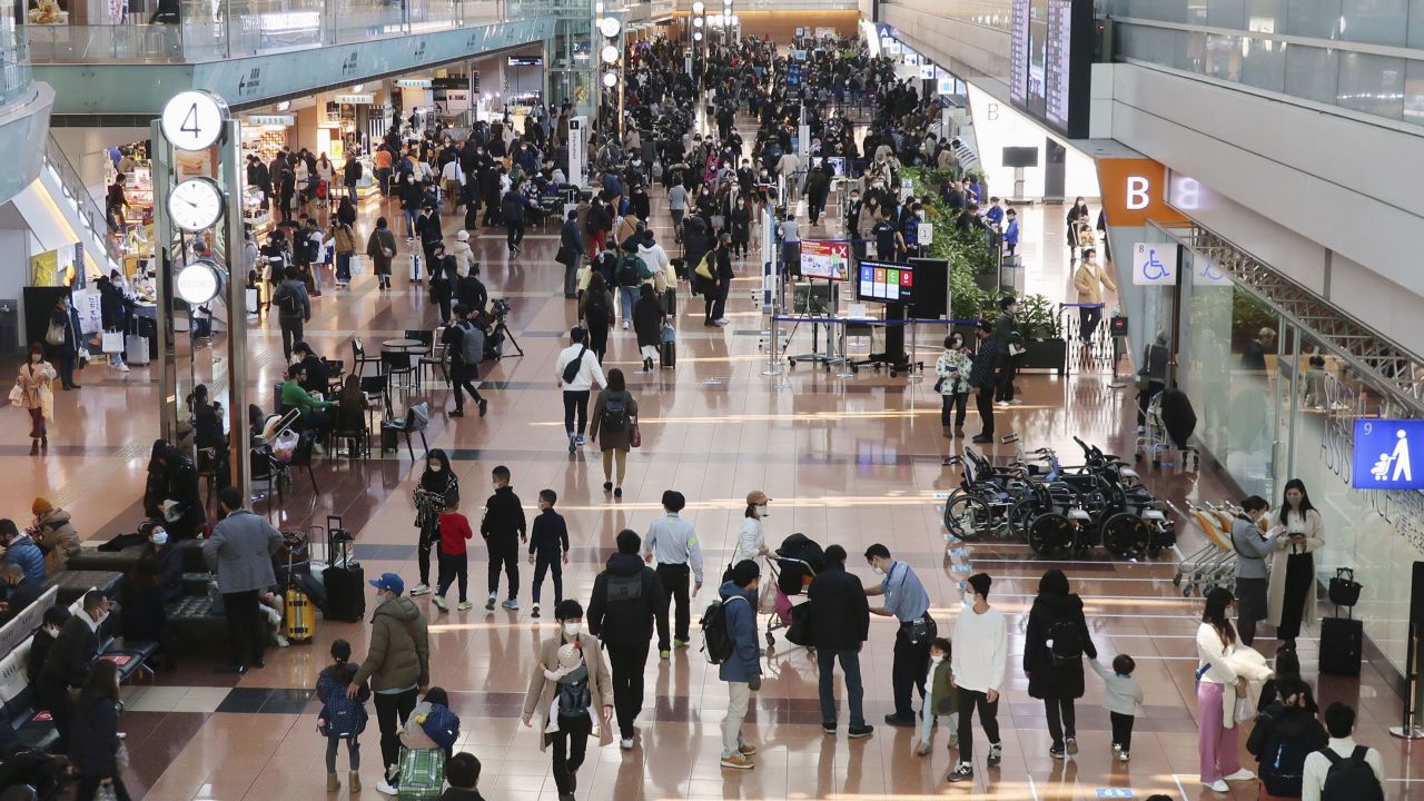Travelers on Saturday at Tokyo's Haneda airport.