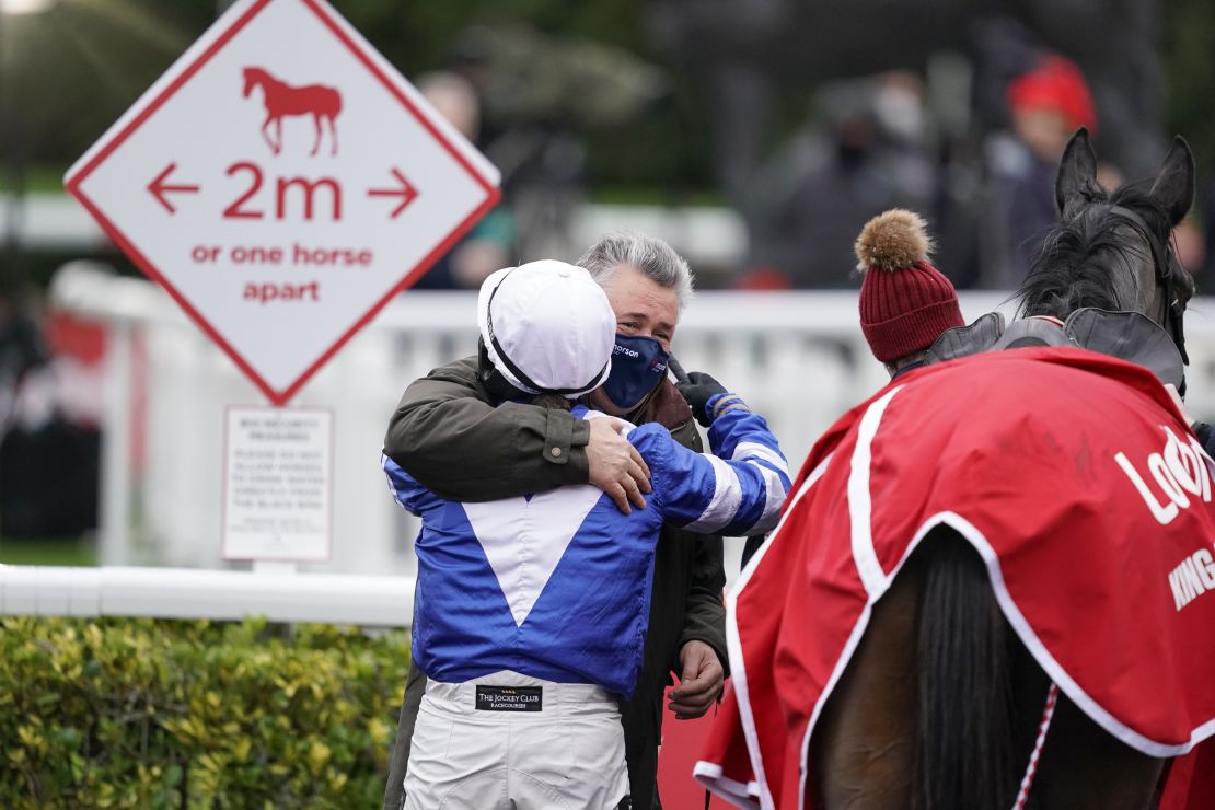 Bryony Frost gets a hug from trainer Paul Nicholls after riding Frodon to a brilliant victory in the King George VI Chase at Kempton Park on Boxing Day.