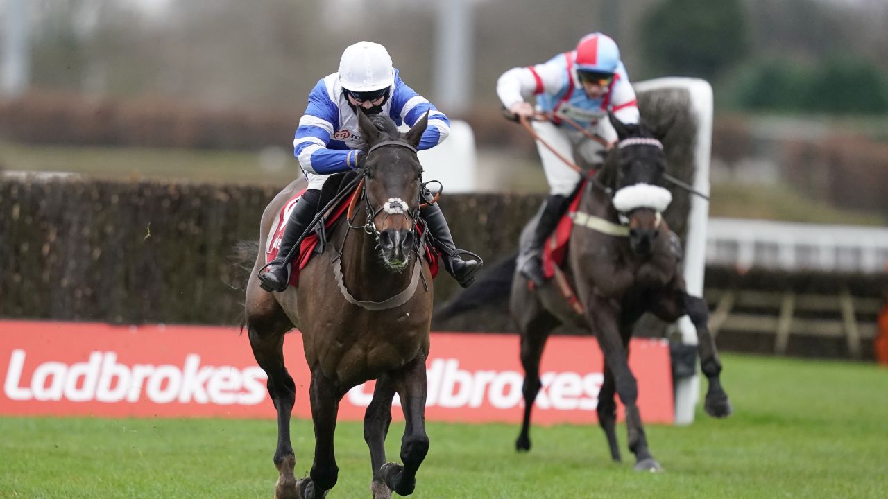 Bryony Frost rides Frodon to victory after clearing the last fence in the King George VI Chase at Kempton Park.