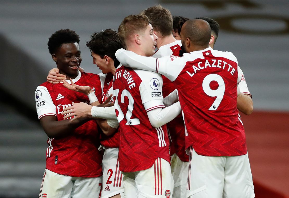 Arsenal's Bukayo Saka (far left) celebrates with his teammates after scoring his side's third goal at the Emirates Stadium against Chelsea.