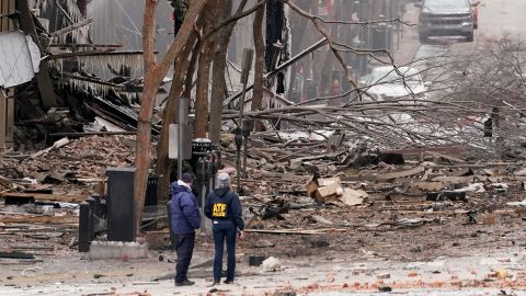Emergency personnel work near the scene of the Nashville explosion Friday.