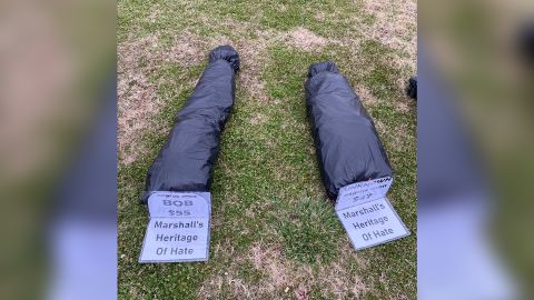 The body bags on the Marshall County Courthouse lawn.