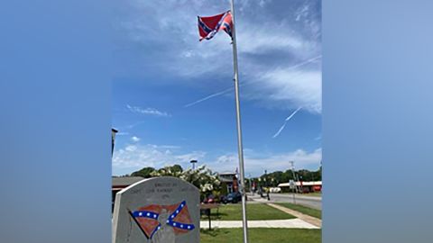 The flag and monument that some protesters are fighting to have removed.