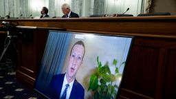 WASHINGTON, DC - OCTOBER 28: CEO of Facebook Mark Zuckerberg appears on a monitor as he testifies remotely during the Senate Commerce, Science, and Transportation Committee hearing 'Does Section 230's Sweeping Immunity Enable Big Tech Bad Behavior?', on Capitol Hill, October 28, 2020 in Washington, DC. CEO of Twitter Jack Dorsey; CEO of Alphabet Inc. and its subsidiary Google LLC, Sundar Pichai; and CEO of Facebook Mark Zuckerberg all testified virtually at the hearing. Section 230 of the Communications Decency Act guarantees that tech companies can not be sued for content on their platforms, but the Justice Department has suggested limiting this legislation. (Photo by Michael Reynolds-Pool/Getty Images)