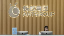 The Ant Group logo is displayed behind a reception desk at the company's headquarters in Hangzhou, China, on Monday, Sept. 28, 2020. 