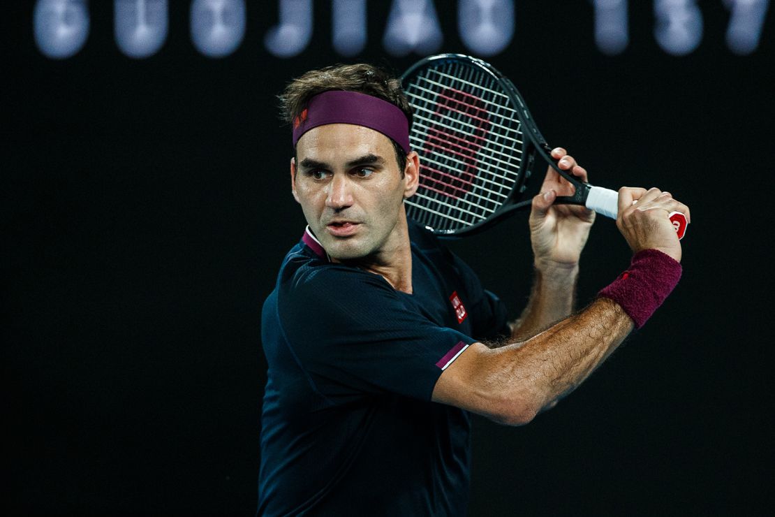 Federer plays a backhand in his semifinal match against Novak Djokovic on day 11 of the 2020 Australian Open at Melbourne Park on January 30, 2020 in Melbourne, Australia.