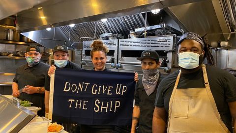Chef Antonia Lofaso with her restaurant team as they prepare takeout dinners. Lofaso, a Food Network personality, is featured in the documentary "Restaurant Hustle 2020: All on the Line," about the struggle felt by restaurants during the global pandemic. 