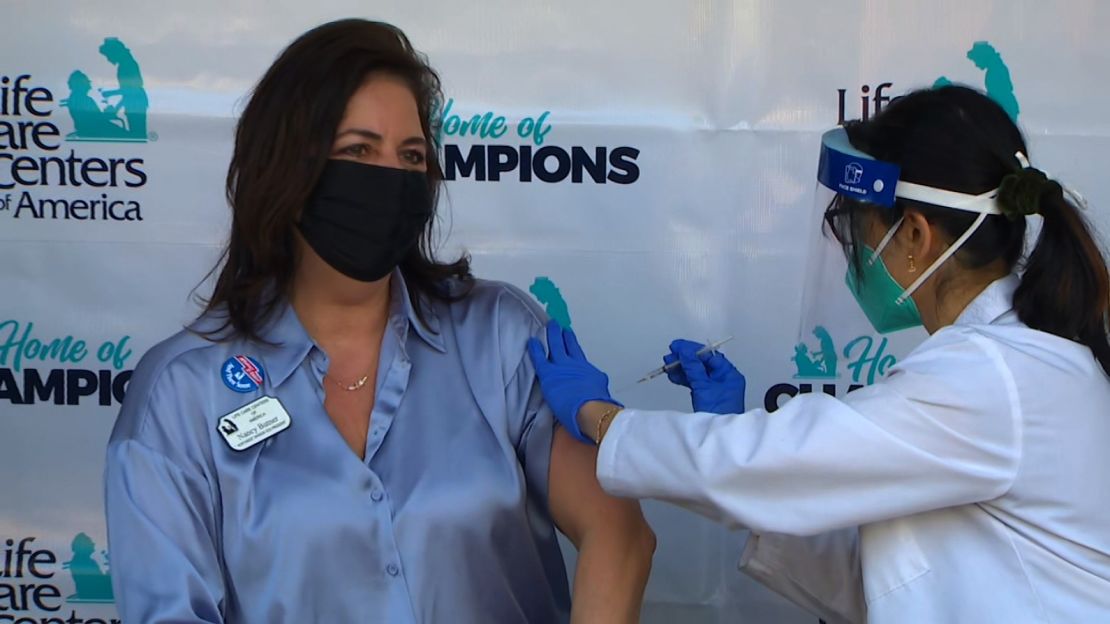 Nancy Butner, vice president of Life Care's Northwest Division, receives the vaccine on Monday.