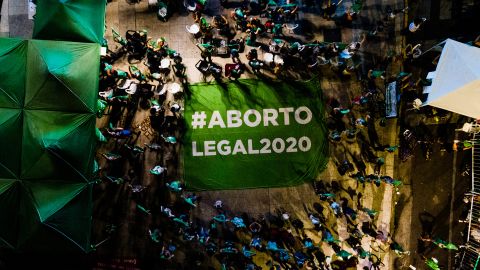 Protesters hold a banner that reads, "Legal Abortion," outside the National Congress in Buenos Aires on December 10.