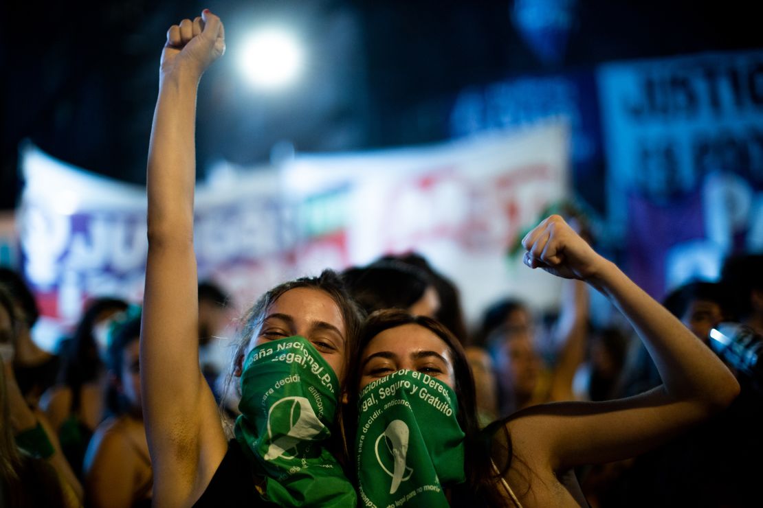 Activists celebrate after Argentina's lower house approved a bill to legalize abortion on December 10.