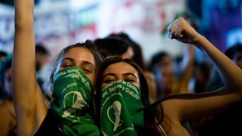 Activists celebrate after Argentina's lower house approved a bill to legalize abortion on December 10.