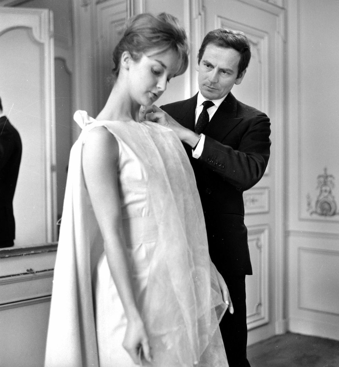 Pierre Cardin creating a dress for Danielle Lebrun in 1962.