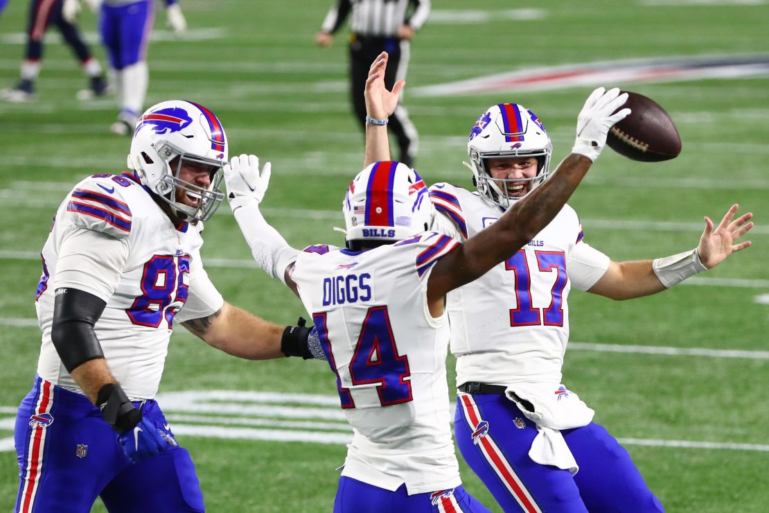 Lee Smith (left) and Allen  celebrate with Diggs (middle). 