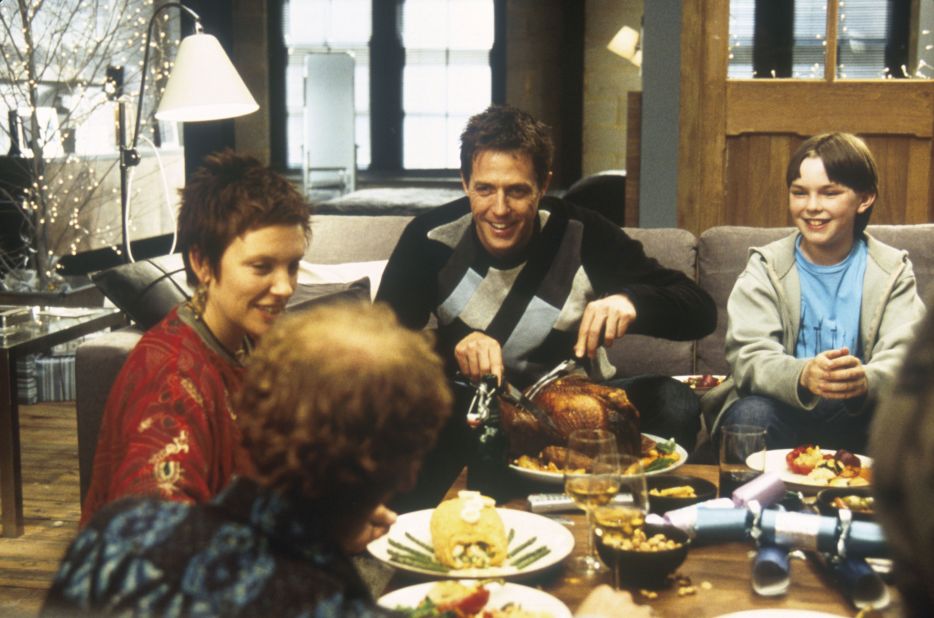 (From left) Toni Collette, Hugh Grant and Nicholas Hoult star in "About a Boy," a 2002 film about a self-serving single man who matures as a result of a bond formed with a fatherless teen.