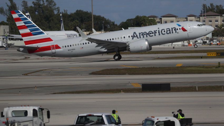 MIAMI, FLORIDA - DECEMBER 29: American Airlines flight 718, a Boeing 737 Max, takes off from Miami International Airport to New York on December 29, 2020 in Miami, Florida. The Boeing 737 Max flew its first commercial flight since the aircraft was allowed to return to service nearly two years after being grounded worldwide following a pair of separate crashes. (Photo by Joe Raedle/Getty Images)