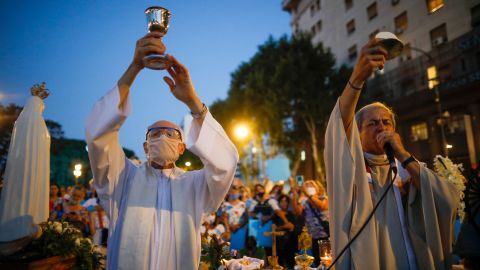 Catholic priests hold a mass during an anti-abortion protest as lawmakers debated its legalization, outside Congress in Buenos Aires on Tuesday.