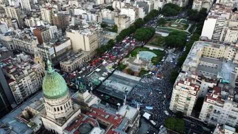 Abortion-rights activists, left, and activists against abortion, right, rally outside Argentina's Congress in the capitol of Buenos Aires on Tuesday as lawmakers debated a bill that legalized abortion. 