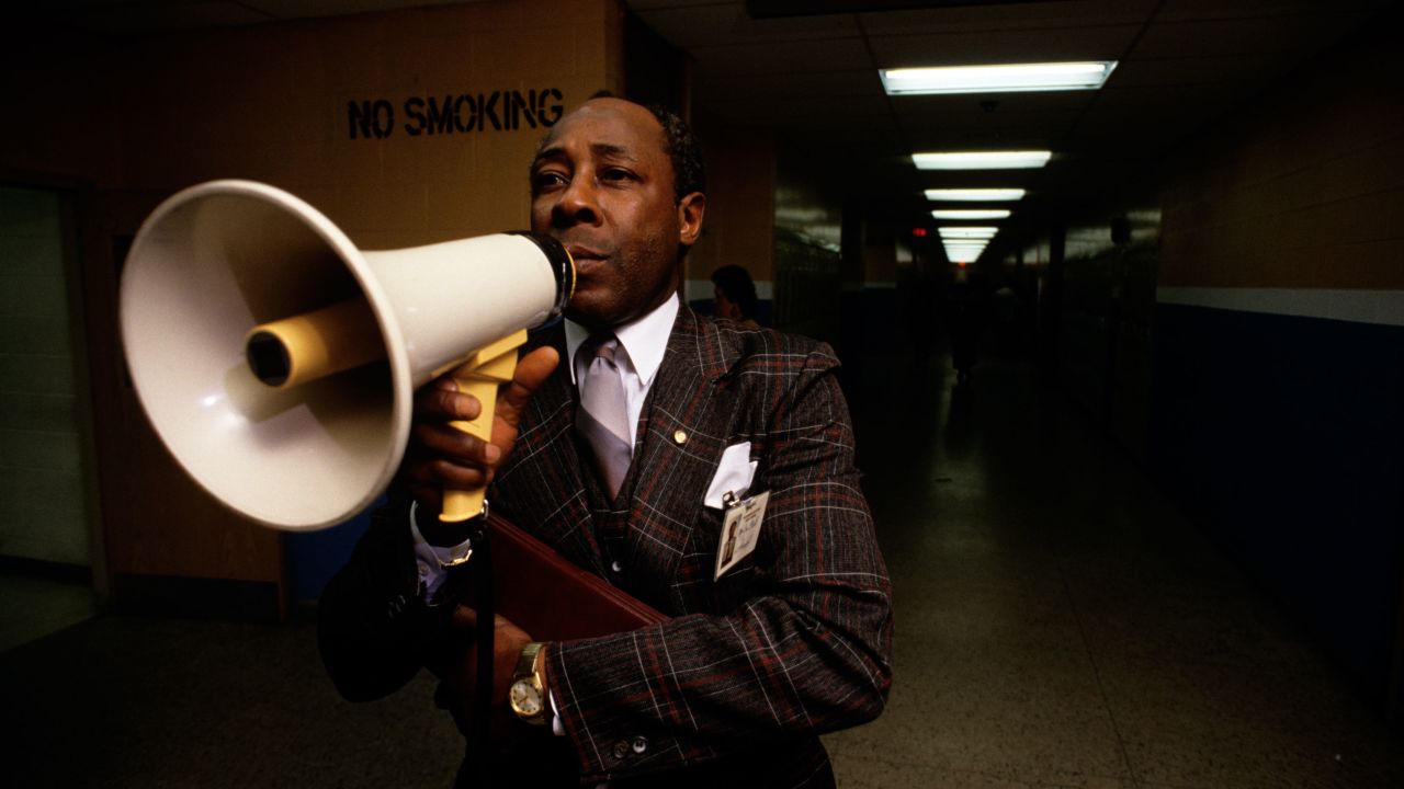 Joe Clark, principal of Eastside High School in Paterson, New Jersey, poses for a photo in the school hallways in February 1988.