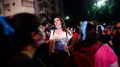 An anti-abortion campaigner reacts after the Senate voted in favor of a bill to legalize abortion on Wednesday.