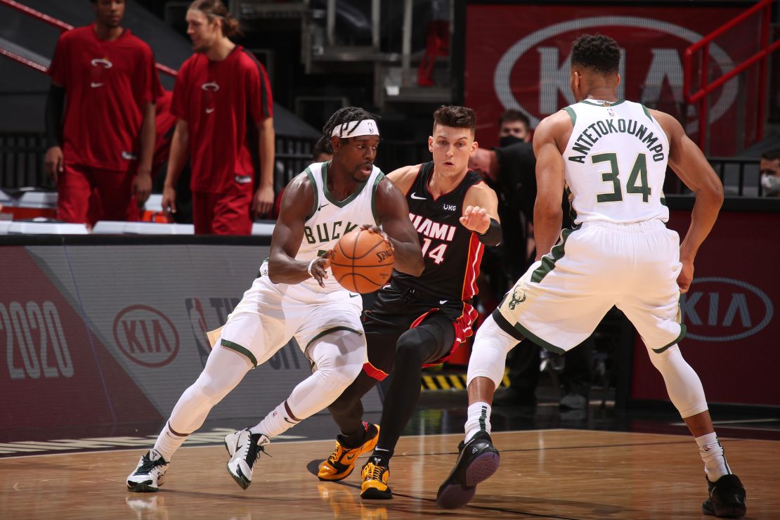 Jrue Holiday (left) led the Bucks in threes, making six of his 10 attempts.
