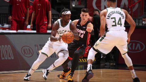 Jrue Holiday (left) led the Bucks in threes, making six of his 10 attempts.