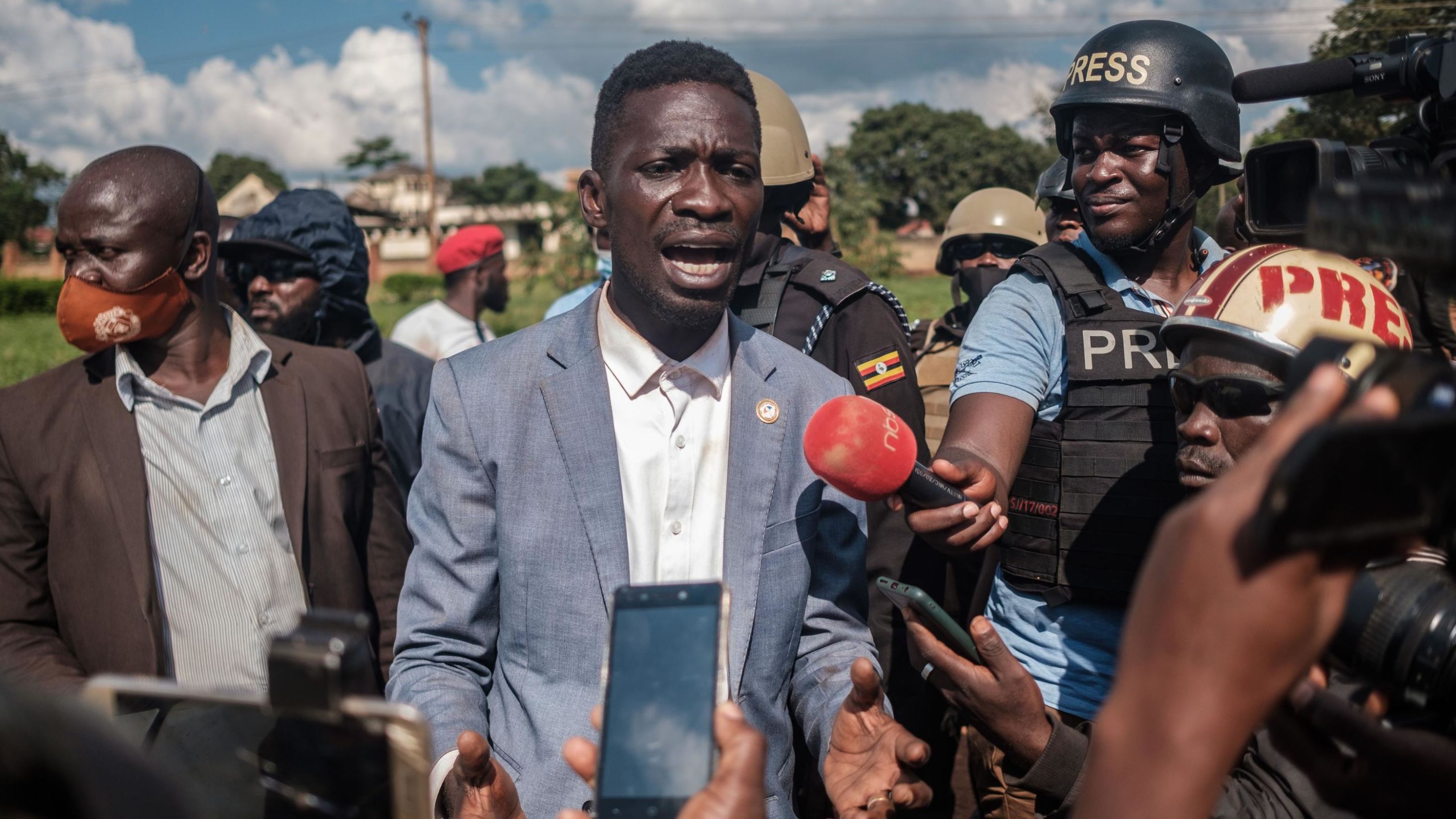 Bobi Wine addresses the media after his car was shot by police in Jinja during his campaign trail on December 1, 2020