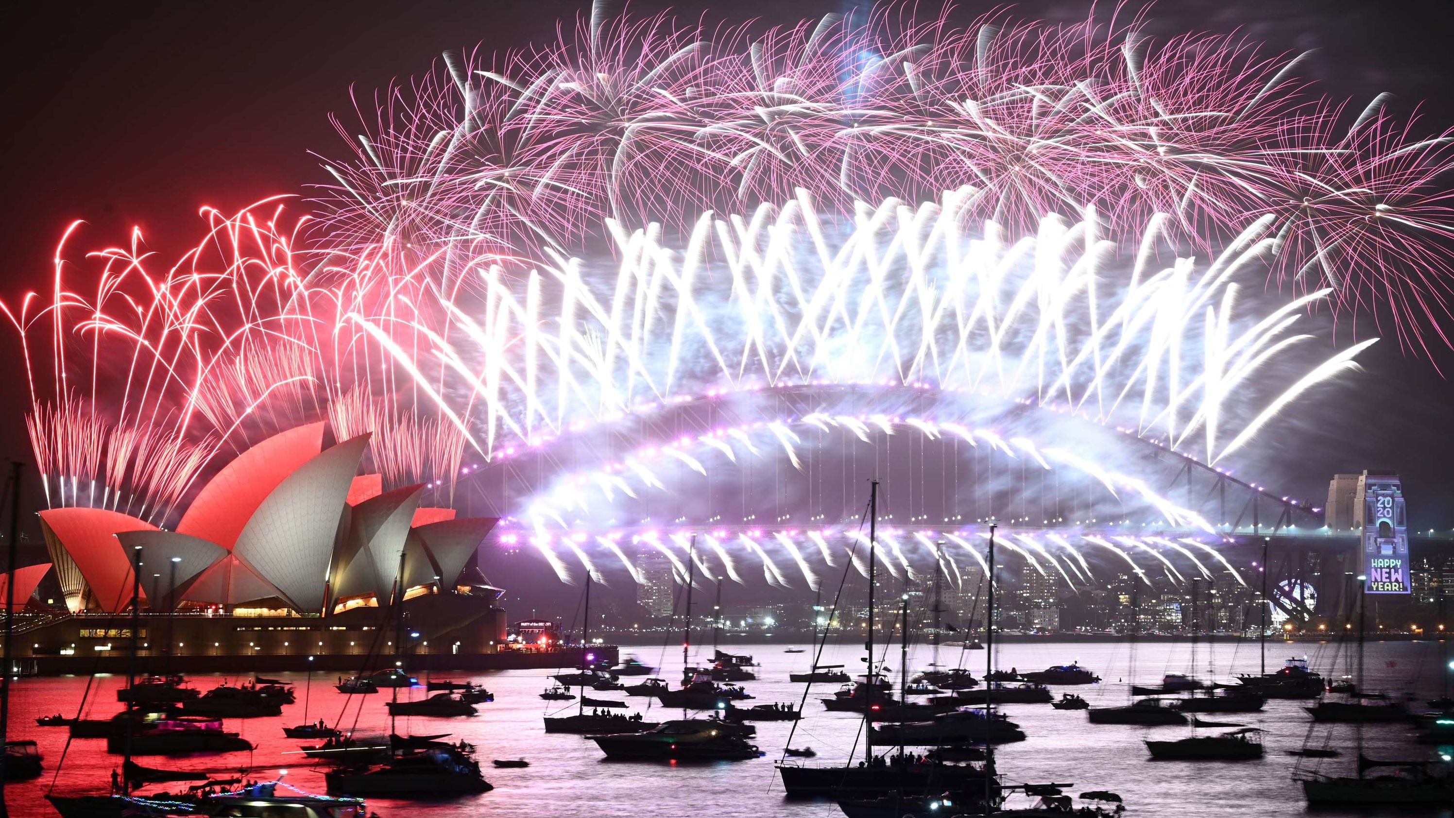 New Year's Eve fireworks erupt over Sydney's Harbour Bridge and Opera House during the fireworks show on January 1, 2020.