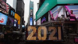 TOPSHOT - The "2021" New Year's Eve numerals are lit up after arriving in Times Square plaza in New York on December21, 2020. (Photo by Kena Betancur / AFP) (Photo by KENA BETANCUR/Afp/AFP via Getty Images)