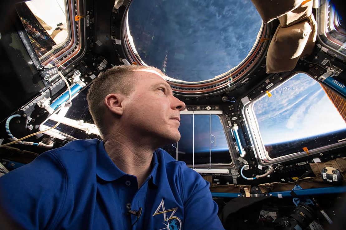 Virts is shown inside the space station's cupola.