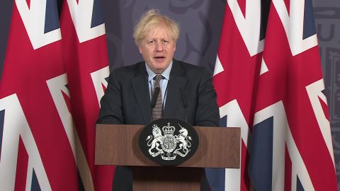Boris Johnson surrounded by Union flags 