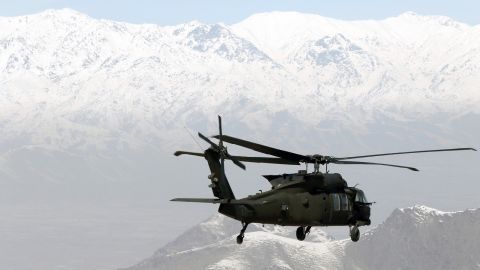 A UH-60 with 1st Armored Division Combat Aviation Brigade transports troops across the Combined Joint Operations Area of Afghanistan.