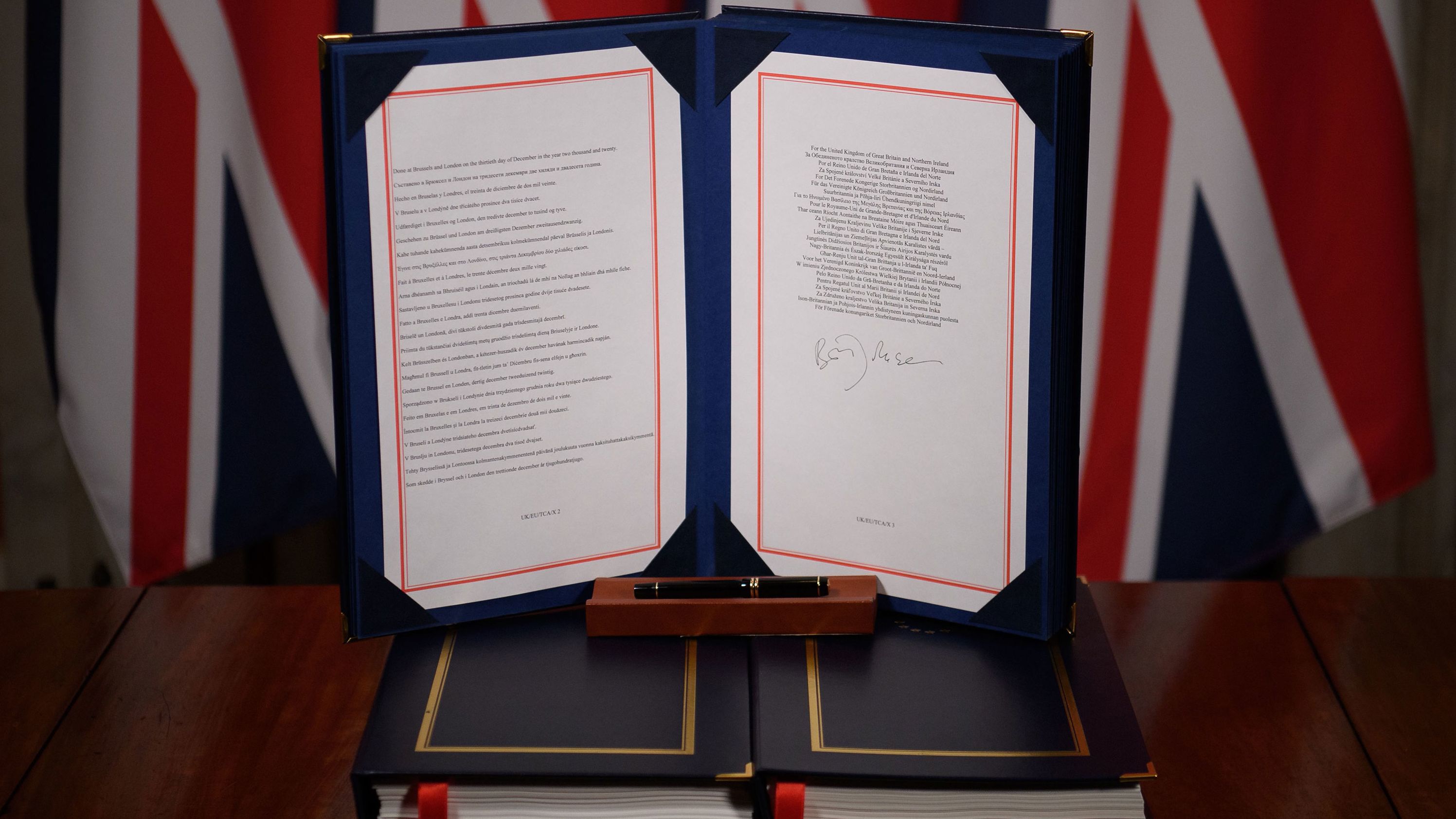 A picture shows the signature of UK Prime Minister Boris Johnson on the Trade and Cooperation Agreement between the UK and the EU at 10 Downing Street in London on December 30.