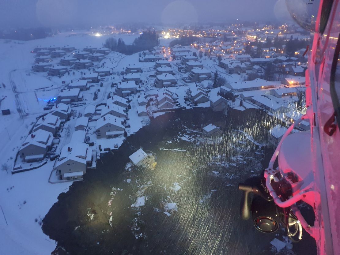 A rescue helicopter view shows the aftermath of the incident.