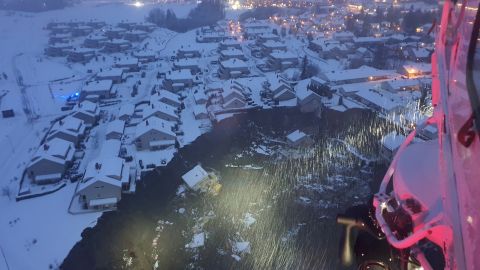 A rescue helicopter view shows the aftermath of the incident.