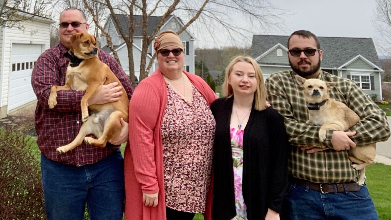 (From left) Chris and Jada Weiler of Canal Fulton, Ohio, are shown with their daughter, Nikkie Weiler, and her fiancé, Nathaniel Barr, along with dogs Chip and Bullet.