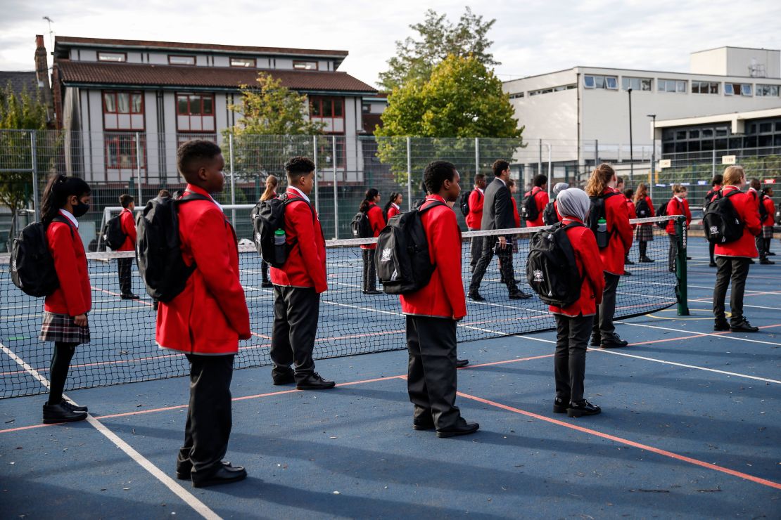 Seventh-grade students practice social distancing measures at City of London Academy Highgate Hill on September 4, 2020 in London.