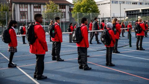 Seventh-grade students practice social distancing measures at City of London Academy Highgate Hill on September 4, 2020 in London.