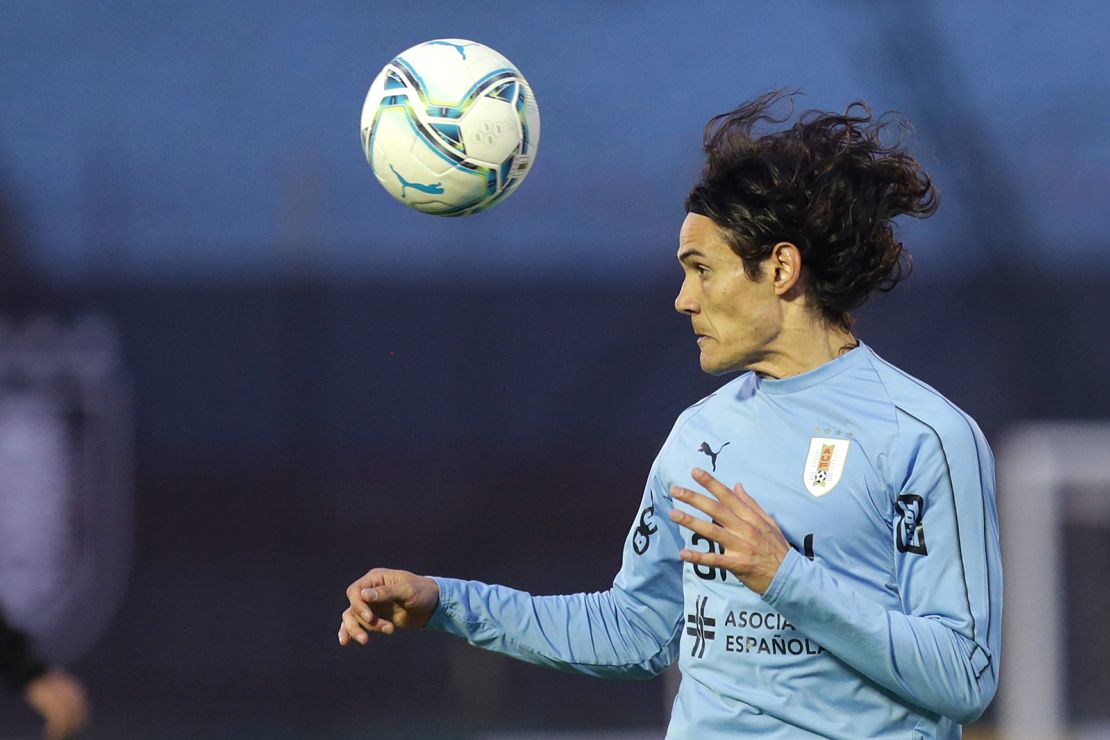Cavani of Uruguay heads the ball during the warmup before a South American World Cup qualifier against Brazil  on November 17, 2020 in Montevideo, Uruguay.