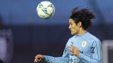 Cavani of Uruguay heads the ball during the warmup before a South American World Cup qualifier against Brazil  on November 17, 2020 in Montevideo, Uruguay.