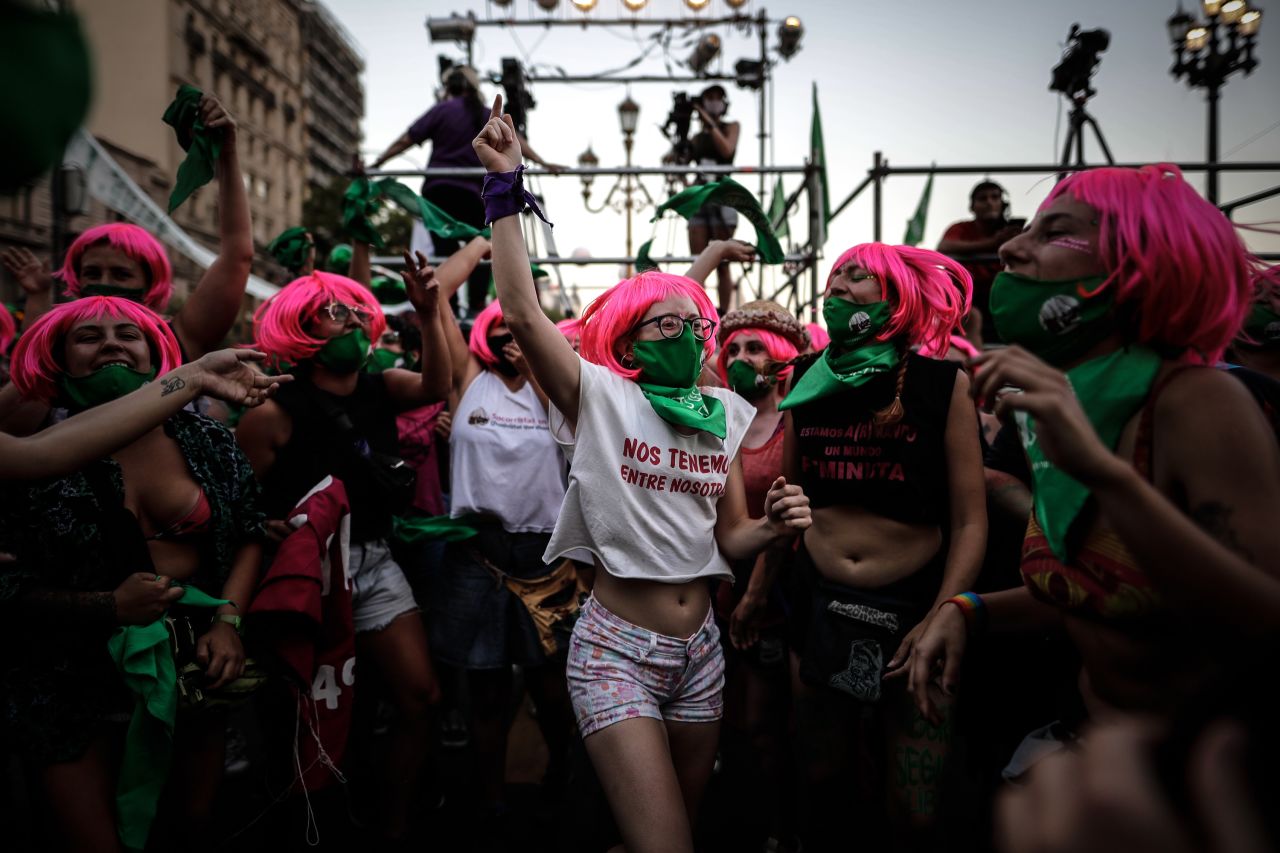 Pro-abortion-rights protesters wait outside the National Congress in Buenos Aires on Tuesday, December 29. Argentina's Senate approved a bill Wednesday <a href="https://www.cnn.com/2020/12/30/americas/argentina-abortion-senate-vote-intl/index.html" target="_blank">to legalize abortion.</a>