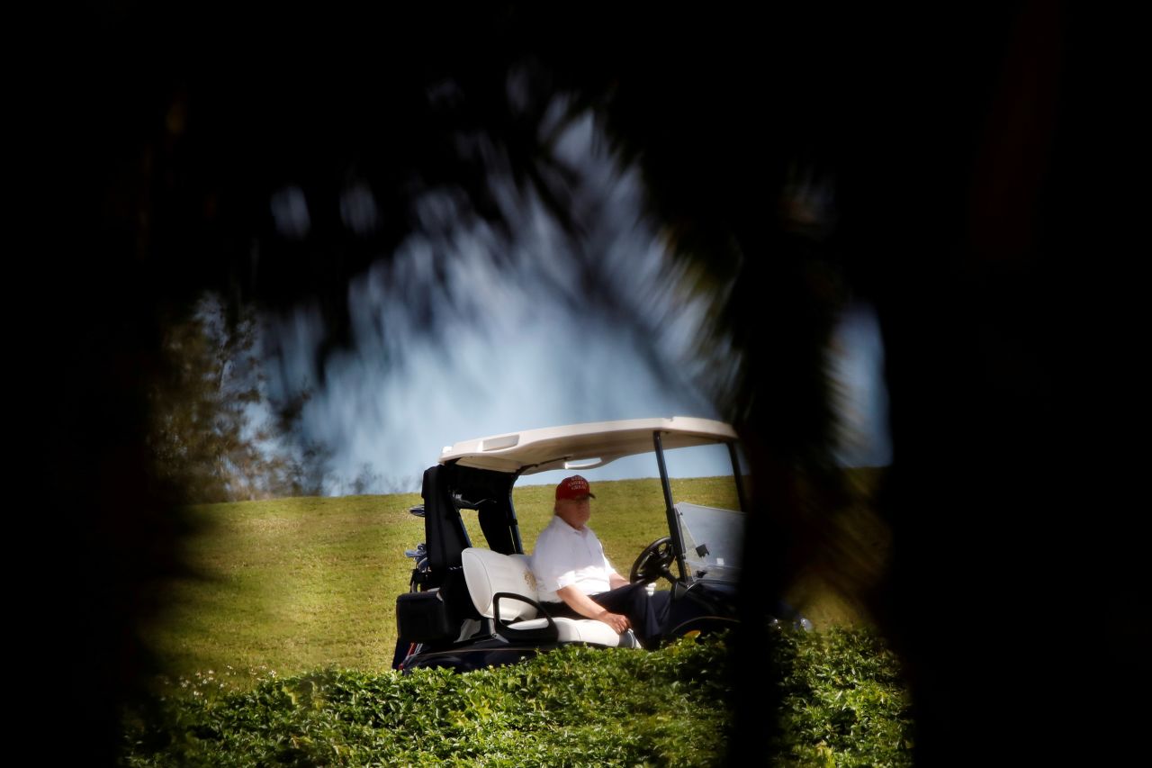 US President Donald Trump plays golf at the Trump International Golf Club in West Palm Beach, Florida, on Monday, December 28.