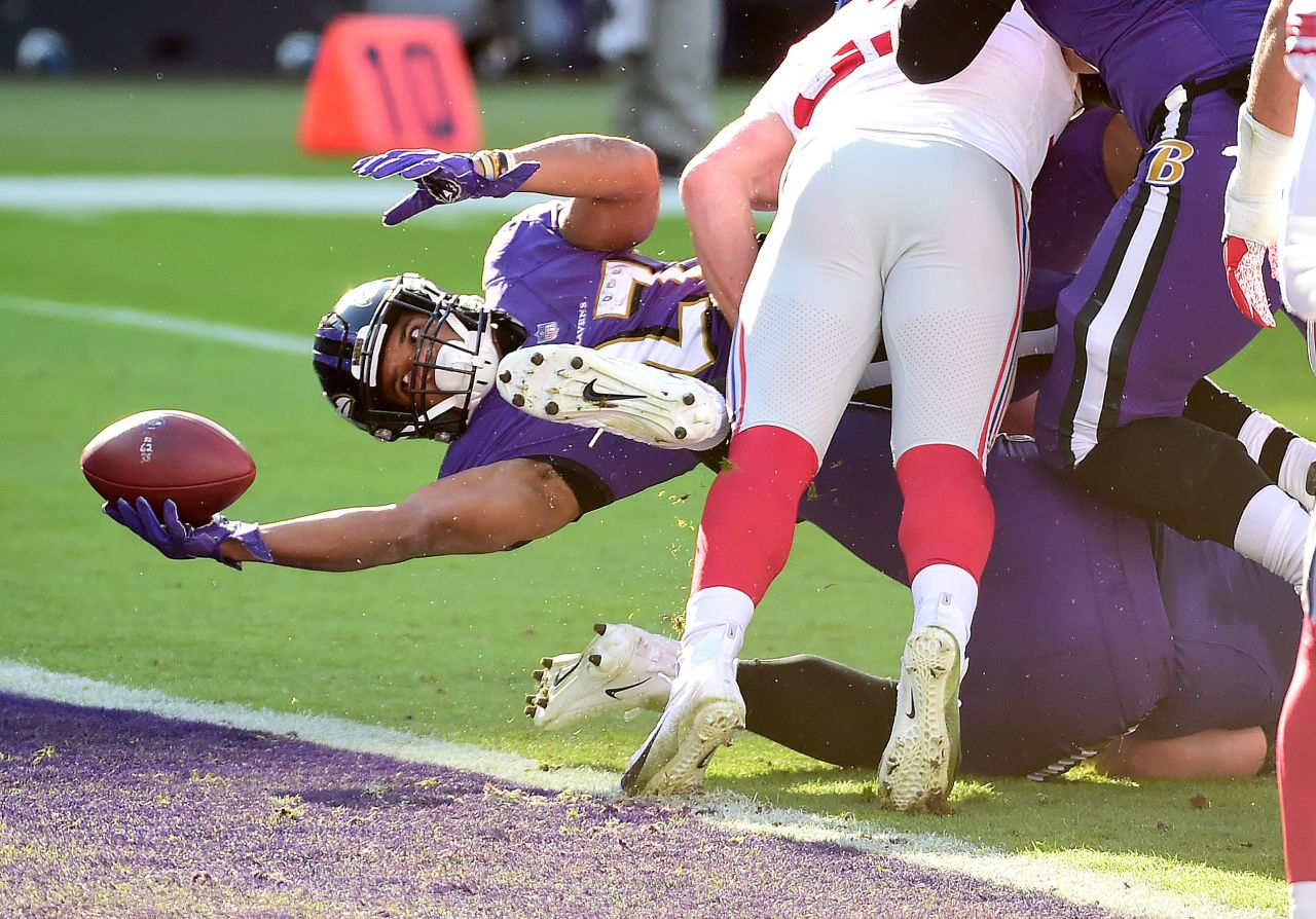 Baltimore running back J.K. Dobbins scores a touchdown during an NFL game against the New York Giants on Sunday, December 27. The Ravens won 27-13.