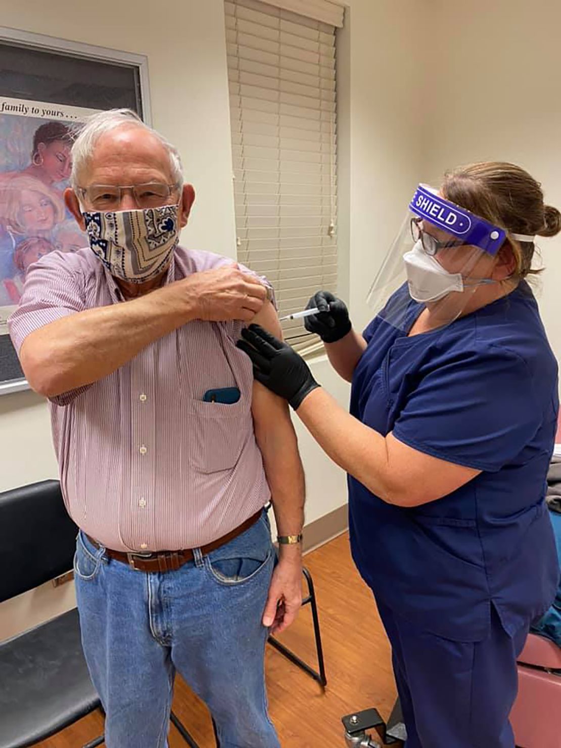 Angie Gray vaccinates former Berkeley County commission president "Admiral" Bill Stubblefield.