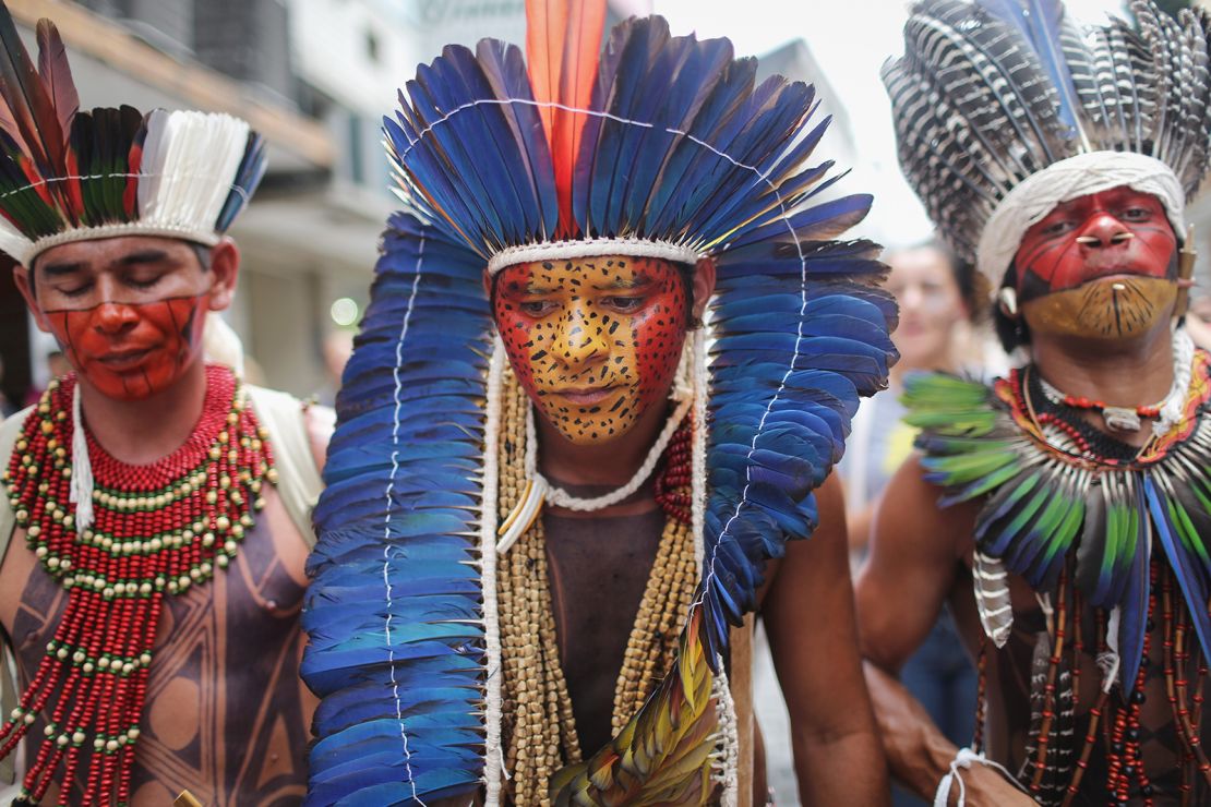 Tribe members march for indigenous territorial rights on November 11, 2015 in Angra dos Reis, Brazil. Members of the Pataxo and Guarani tribes in Rio de Janeiro state joined the march. 