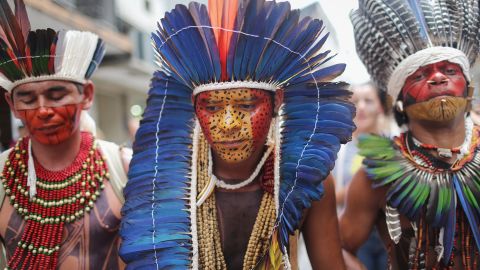Tribe members march for indigenous territorial rights on November 11, 2015 in Angra dos Reis, Brazil. Members of the Pataxo and Guarani tribes in Rio de Janeiro state joined the march. 