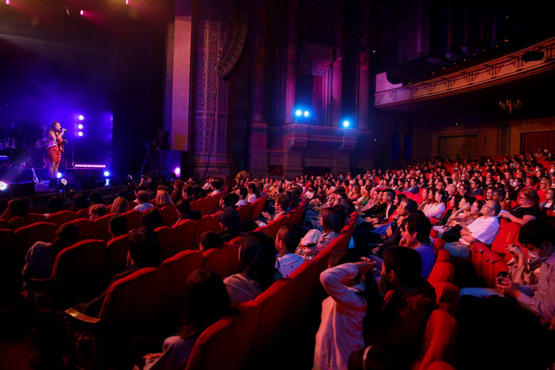 By late 2021, Americans hope to see some normalcy return to their lives. Here, people attend a performance at the Civic Theatre on November 27, 2020 in Auckland, New Zealand. 