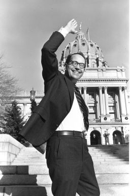 In this December 13, 1978, file photo, Pennsylvania Governor-elect Dick Thornburgh waves at photographers from the front steps of the Sate Capitol in Harrisburg, Pennsylvania. 