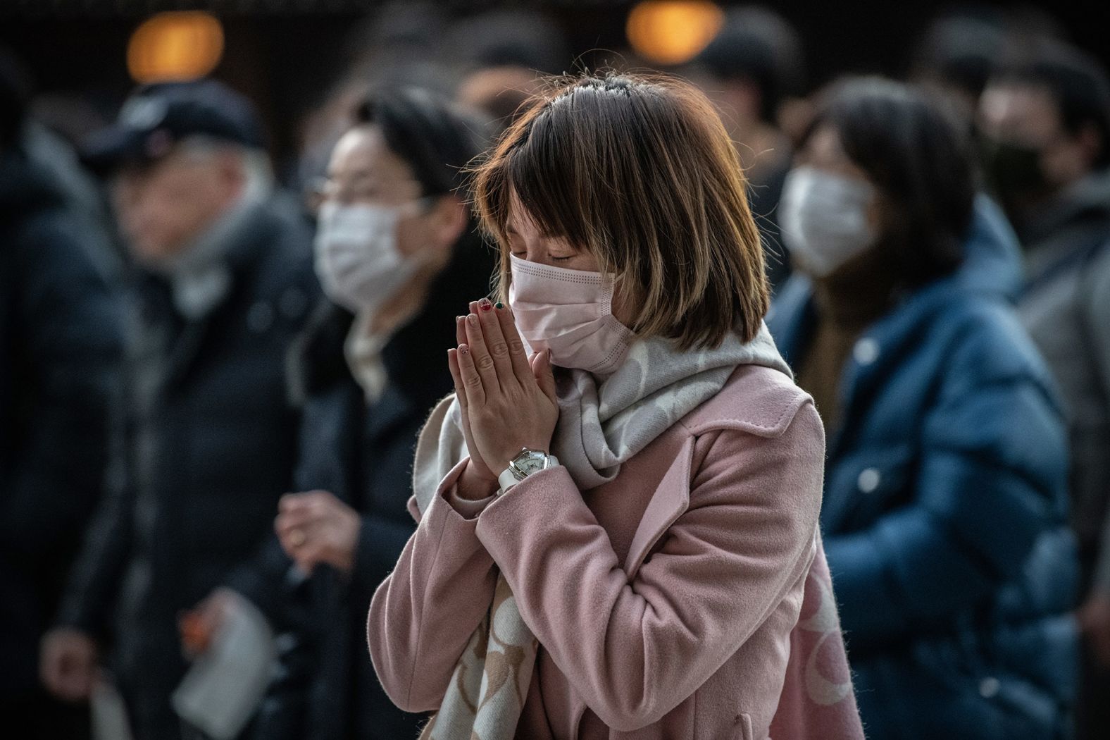 People pray for the new year at the Meiji Shrine in Tokyo.