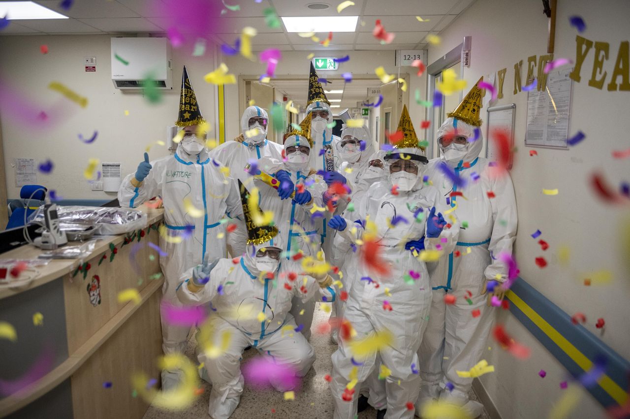 Health-care workers <a href="https://www.cnn.com/2020/12/31/world/gallery/2021-new-year-celebrations/index.html" target="_blank">celebrate the new year</a> in the intensive care unit at the San Filippo Neri Hospital in Rome.