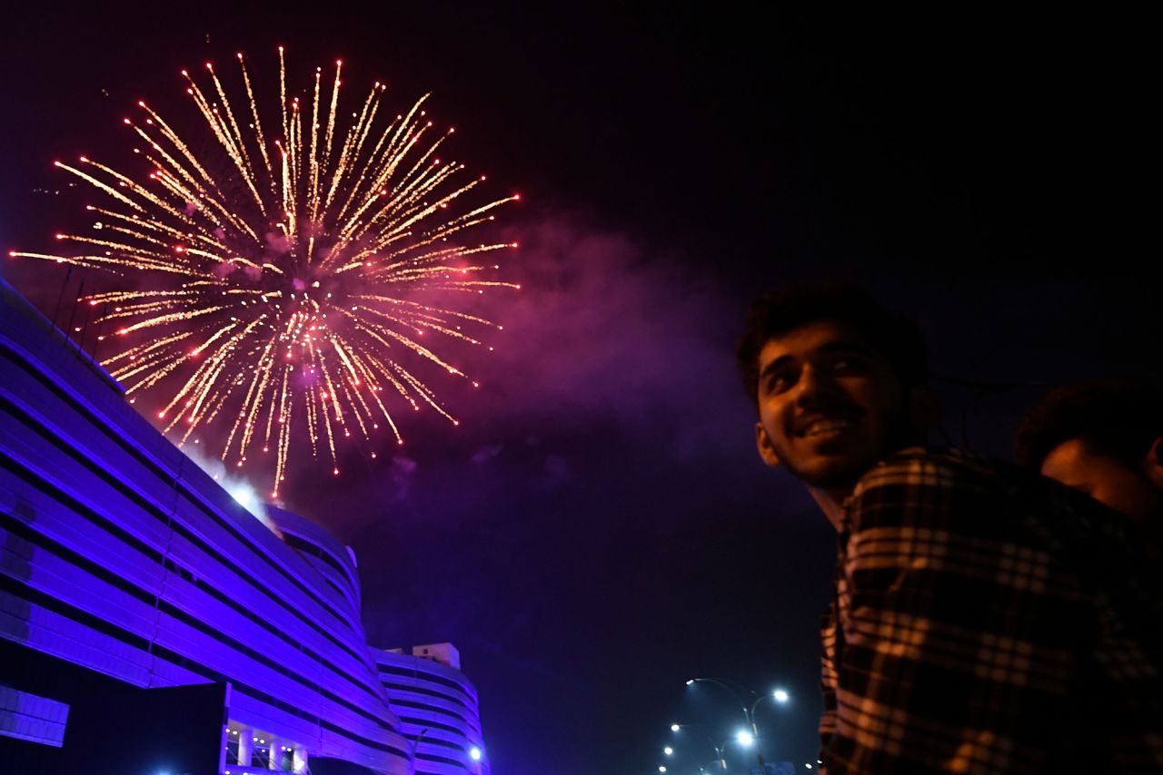 People watch fireworks in Rawalpindi, Pakistan.